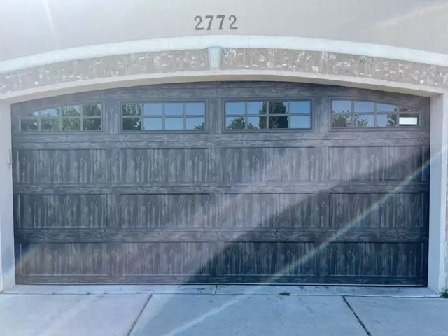 Modern black wooden garage door